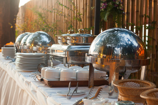 Many buffet heated trays ready for service