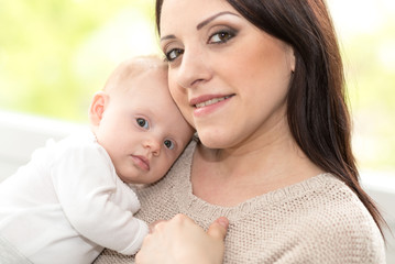 Portrait of mother and baby