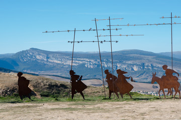 Way of Santiago. Camino de Santiago. Monument of pilgrims on mountain Perdon, near Pamplona, Navarra, Spain. - obrazy, fototapety, plakaty