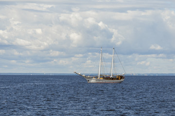 Two-masted Sailboat in the sea cloudy day