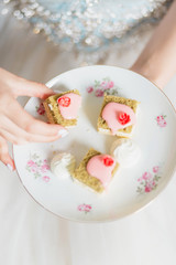  Delicious cakes in female hands