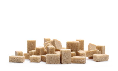 Brown cane sugar cubes isolated on white background