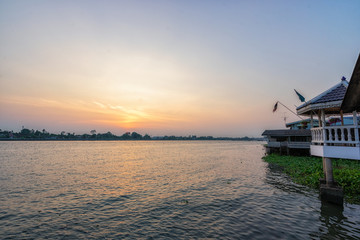 Beautiful sky and sunset with evening time, along the Chao Phraya river in Bangkok, Thailand.  