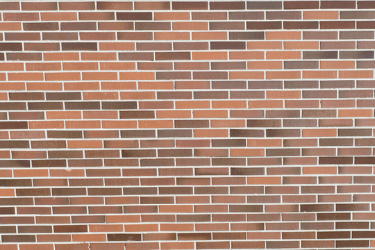 Pared con textura de ladrillos oscuros 