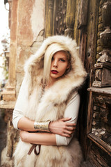Young woman wearing fur jacket outdoor
