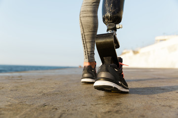 Close up back view of disabled athlete woman