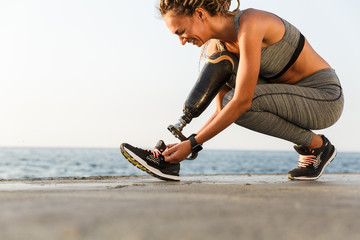 Smiling disabled athlete woman
