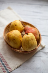 Fruit background. Fresh organic pears on old wood. Pear autumn harvest