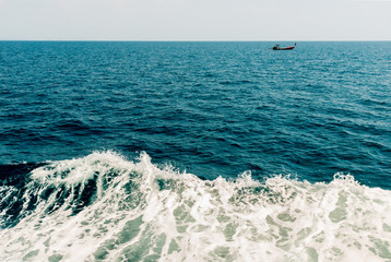 Wave of ship on water surface in the sea