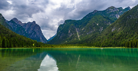 Naklejka na ściany i meble Lake Dobbiaco (Toblacher See, Lago di Dobbiaco) in Dolomite Alps, South Tirol, Italy - Travel destination in Europe