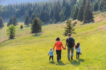 Family Walking on Meadow