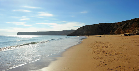 Beach and cliff of Sagres. Bathed by the Atlantic Ocean is one of the most visited by European tourism. Algarve, south of Portugal.