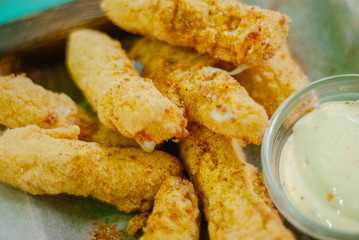 fried mozzarella cheese sticks breaded with sauce