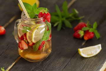 cocktail with fresh fruits, berries and mint