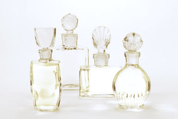 Vintage bottles of perfumes as background