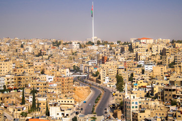 AMMAN, JORDAN - Nov 2009: A view of the bustling, busy city of Amman in Jordan and its giant...