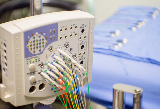 EEG or Electroencephalography hardware equipment in clinic. - Powered by Adobe