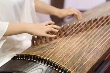 Playing the zither's moment