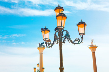 Fototapeta na wymiar Venice historical streetlight against blue sky 