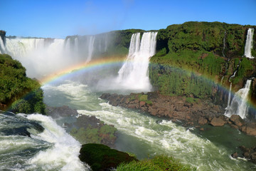 Breathtaking view of Devil's Throat area of Iguazu Falls (UNESCO World Heritage Site) from Brazilian side with gorgeous rainbow, Foz do Iguacu, Brazil 