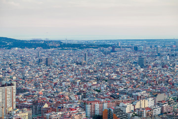 Fototapeta na wymiar Barcelona, Spain. Panoramic view of the city towards the sea from the hill.