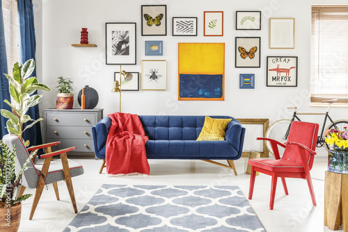 Patterned Carpet In Colorful Living Room Interior With Red