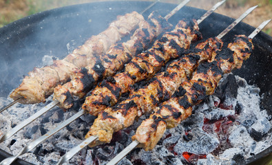 Grilled pork shashlik on skewers