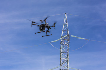Drone inspections for Solar Energy and High Voltage Lines. Operator and screen review