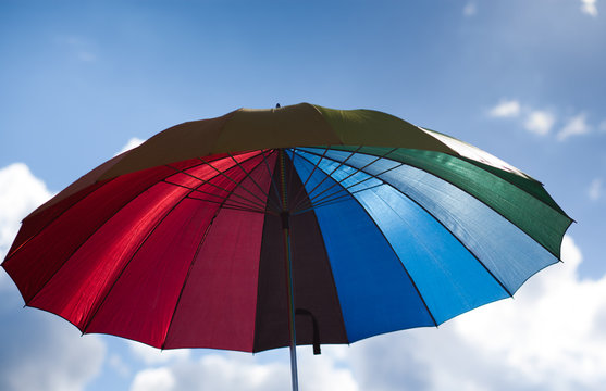 rainbow flag umbrella at pride parade
