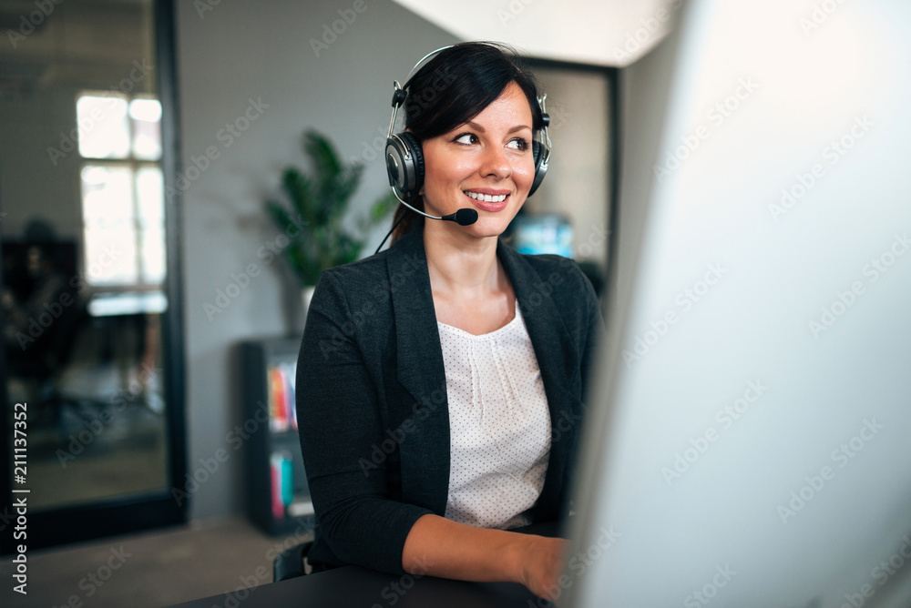 Canvas Prints smiling customer support operator at work.