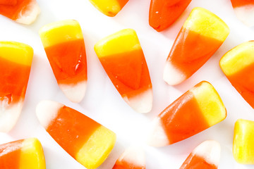 Typical halloween candy corn isolated on white background. Top view. Close up © chandlervid85