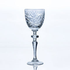 Vintage crystal glasses on the white