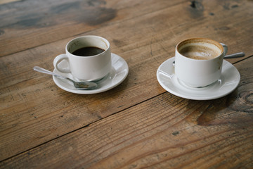 Two white cups of coffee