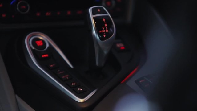 Shift knob of automatic gearbox in car interior