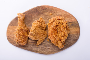 Delicous hot and crispy fried chicken isolated on a white background