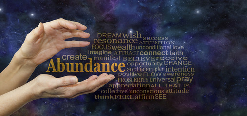 Cosmic Create Abundance Word Tag Cloud - female hands with the word ABUNDANCE floating between surrounded by a relevant word cloud against a deep space blue starry night sky
