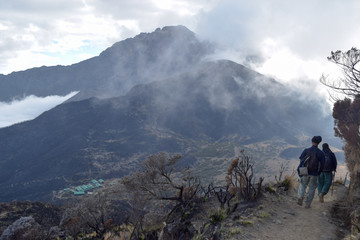 Mount Meru partly covered by clouds seen from the top of Little Meru, Arusha National Park, Tanzania 
