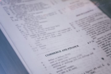 Obraz premium Commerce and finance word on text book