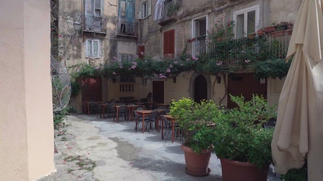 Italy, Clabria Tropea: typical courtyard and restaurant
