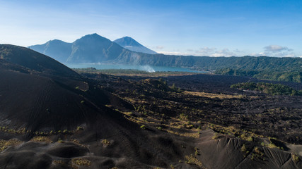 Aerial drone view of volcanic rocky landscape in Bali, Indonesia