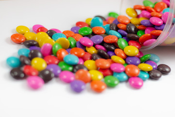 colorful sweet circle shape . sugar yummy balls candy in box on white background . 