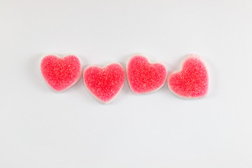 red jelly sweet heart shape . sugar yummy candy on white background for valentine day .