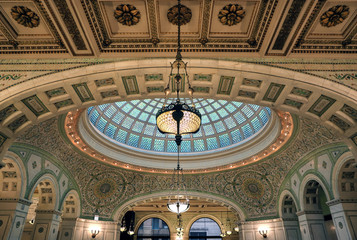 Chicago, Illinois, USA - June 22, 2018 - View of the interior and of the dome at the Chicago Cultural Center. - Powered by Adobe