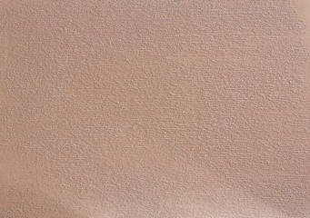 Close-up surface detail of old rough white plaster wall texture, macro.