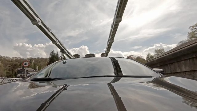 Driving over the Menai Bridge in North Wales towards Anglesey - United Kingdom