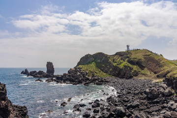 Fototapeta na wymiar Lighthouse on a rock