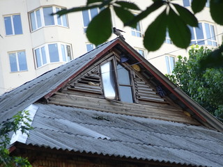 Old house with attic window