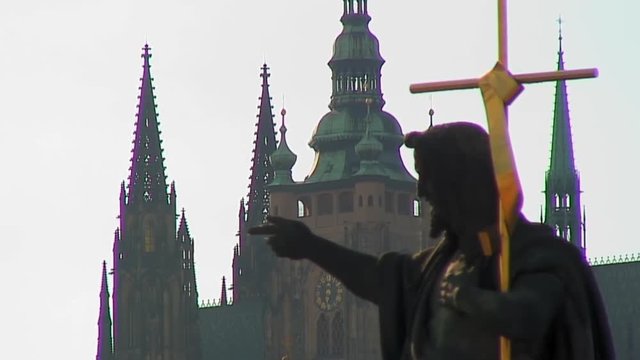Jesus Holding Gold Cross in Prague
