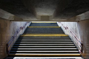 Stairs up at the exit from the underground passage in the metro