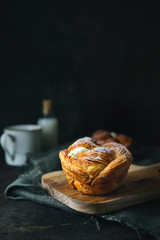 Braided bread on rustic background